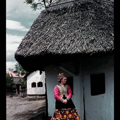 Matyo woman in folk dress waiting